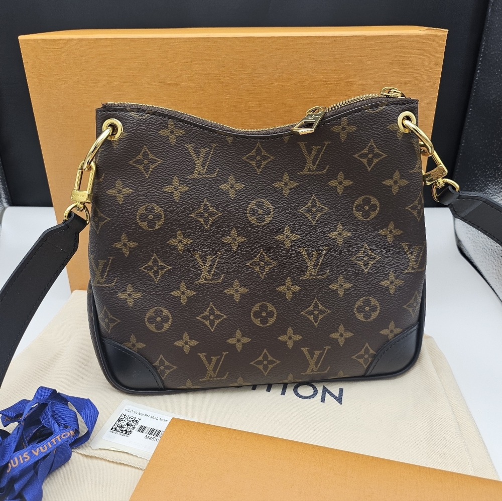 Excellent condition authentic Louis Vuitton Odeon PM monogram with back leather - Picture 11 of 17